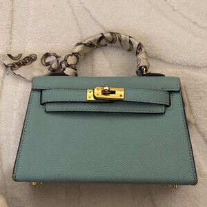 Chic Teal Mini Bag with Scarf Handle